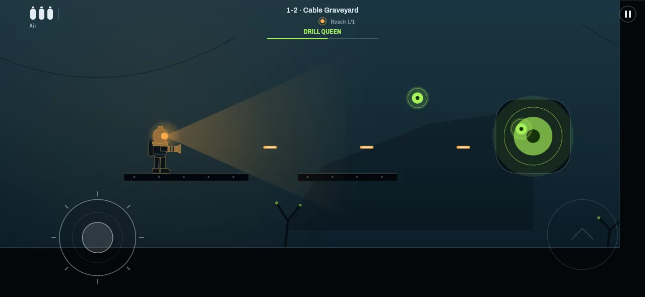 The Drill Queen, a green-glowing core, fills the right side of the arena while the diver fires from a ledge.
