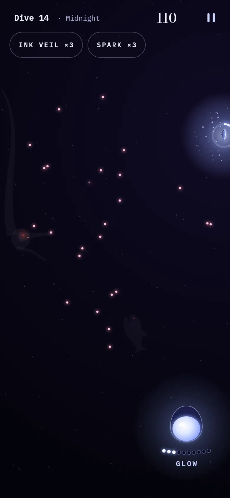 A dive at night: the glowing lanternfish lights a circle of water while pink prey lights drift nearby and the Glow button waits at the bottom right.
