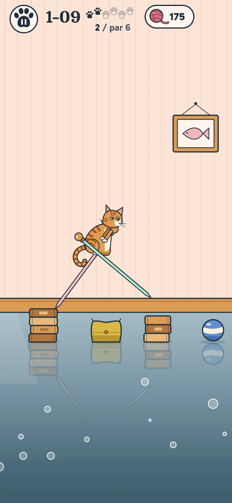 A level in the living room: the tabby strides off a stack of books toward a cushion, more books and a striped rubber ball over the wet floor