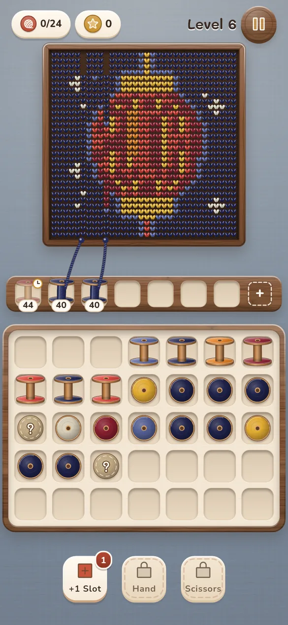Level 6 on a dark blue backdrop: a knitted red lantern takes shape above the board of spools